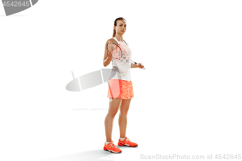 Image of Young woman badminton player standing over white background