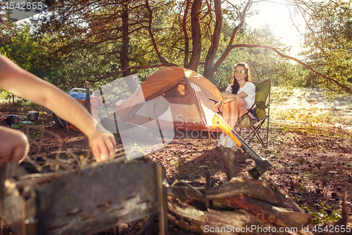 Image of Party, camping of men and women group at forest. They relaxing