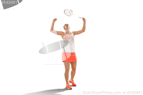 Image of Young woman badminton player as winner posing over white background