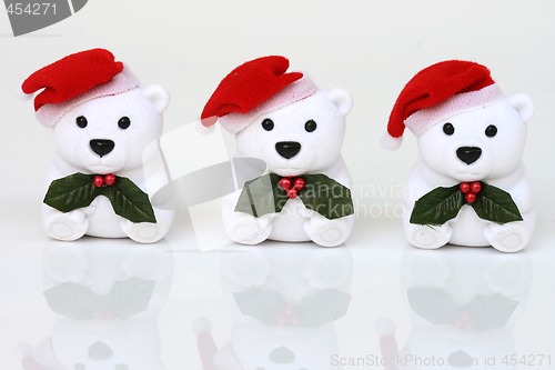 Image of three white santa bears