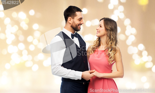 Image of happy couple in party clothes