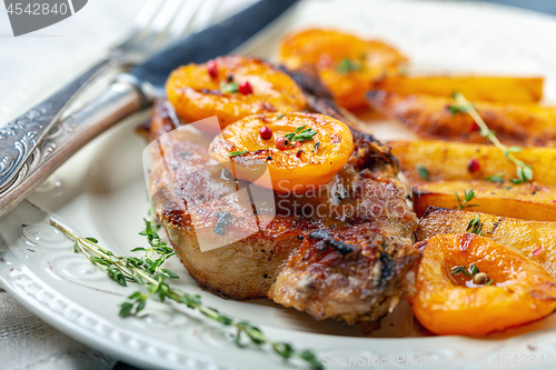 Image of Entrecote of pork with apricots and thyme.