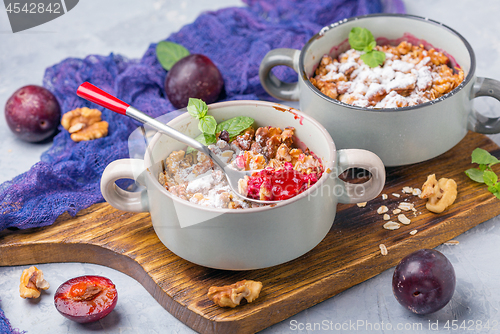 Image of Red cherry plum crumble with walnut crumb.