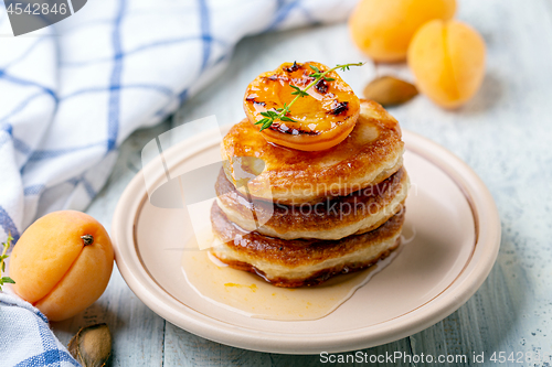 Image of Fritters with apricot jam and thyme for breakfast.