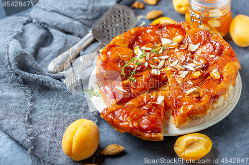 Image of Apricot and almond tarte tatin on a white plate.