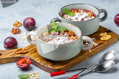 Image of Crumble of red cherry plum, oatmeal and walnut.