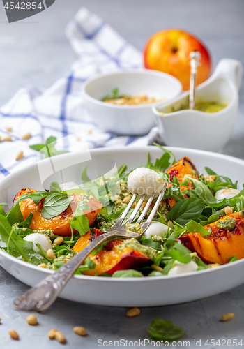 Image of Arugula salad with grilled nectarines.