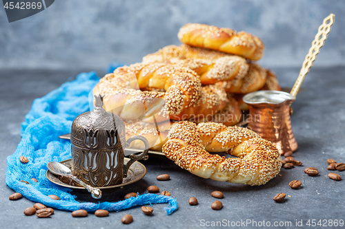 Image of Traditional Turkish bagels and black coffee.