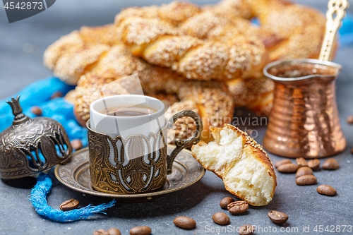 Image of Fresh Turkish bagels with black coffee.