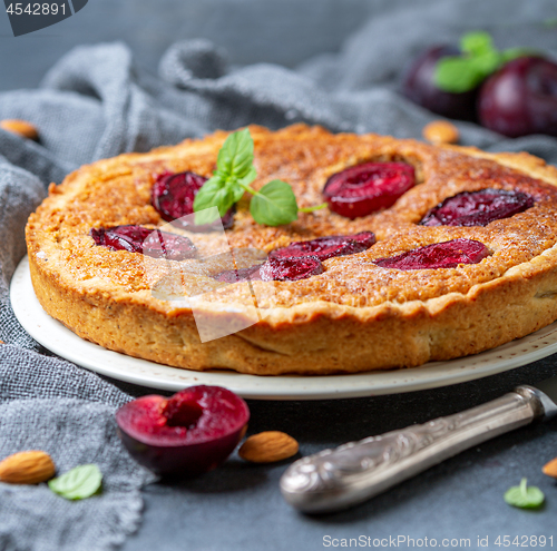 Image of Delicious pie with plums and almond cream.
