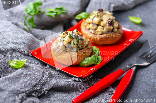 Image of Mushrooms stuffed with eggplant, mushrooms and onions.