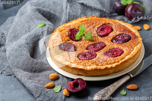 Image of Plum pie with almond cream.