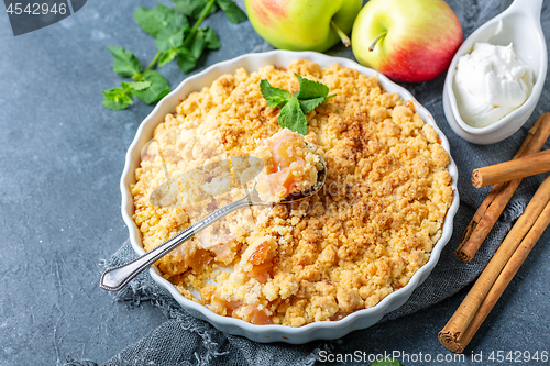 Image of Apple crumble with cinnamon for breakfast.