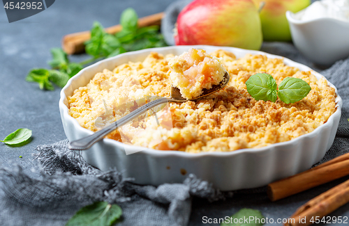 Image of Apple crumbs with cinnamon. Summer dessert.