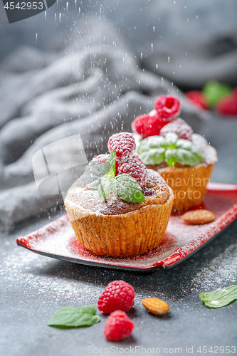 Image of Raspberry tartlets with almond cream.