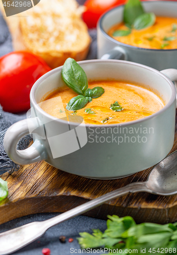 Image of Delicious tomato soup with spices and herbs.