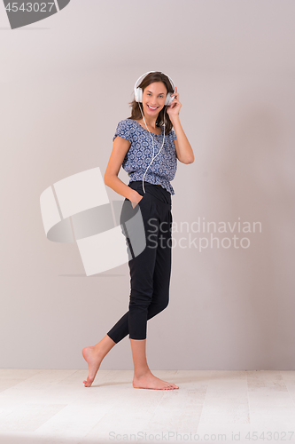 Image of woman with headphones isolated on a white