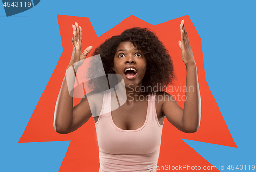 Image of Winning success woman happy ecstatic celebrating being a winner. Dynamic energetic image of female afro model