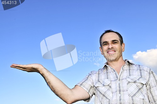 Image of Happy man gesturing