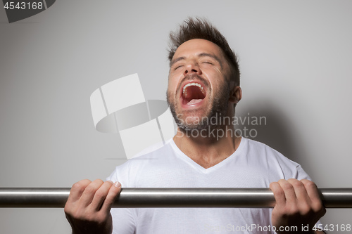 Image of bearded bodybuilding man