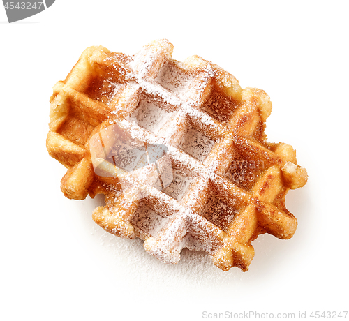Image of freshly baked belgian waffle with powdered sugar