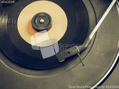 Image of Vintage looking Vinyl record on turntable