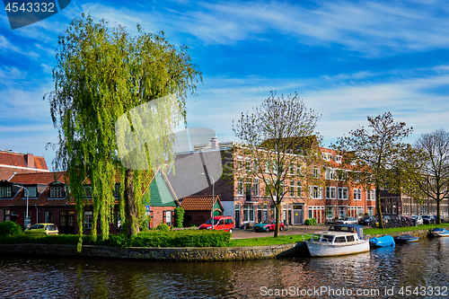 Image of Boats, houses and canal. Harlem, Netherlands