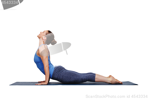 Image of Woman doing Ashtanga Vinyasa yoga Sun Salutation asana