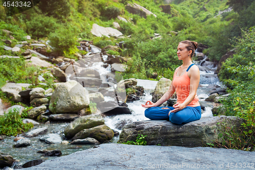 Image of Woman in Padmasana outdoors