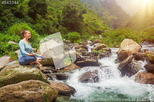 Image of Woman in Padmasana outdoors