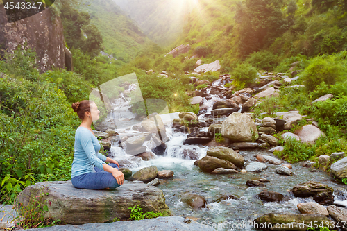 Image of Woman in Padmasana outdoors