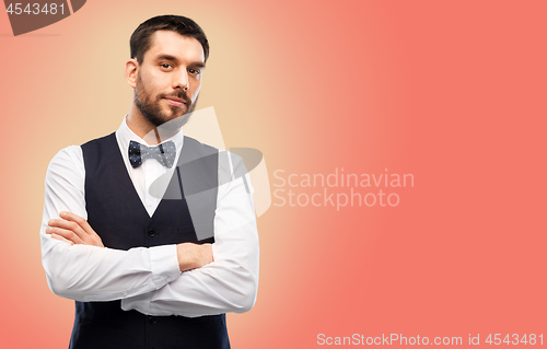 Image of man in party clothes and bowtie