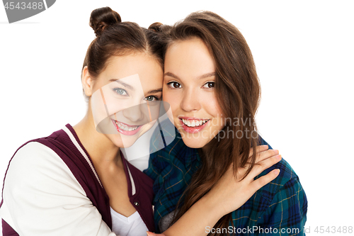 Image of happy smiling pretty teenage girls hugging