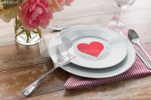 Image of close up of table setting for valentines day