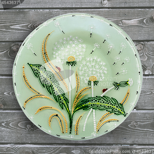 Image of Decorative ceramic plate, hand painted dot pattern with acrylic 