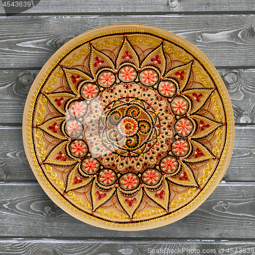 Image of Decorative ceramic plate, hand painted dot pattern with acrylic 