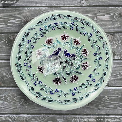 Image of Decorative ceramic plate, hand painted dot pattern with acrylic 