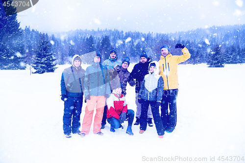 Image of portrait of group young people in beautiful winter landscape