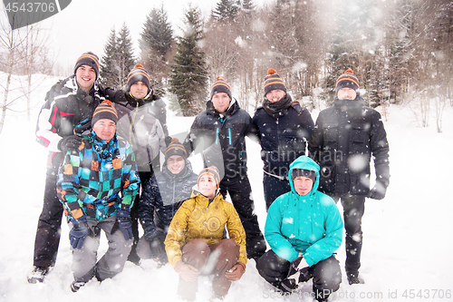 Image of portrait of group young people in beautiful winter landscape