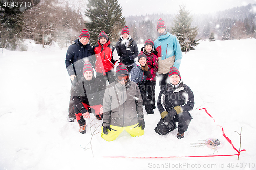 Image of portrait of group young people in beautiful winter landscape