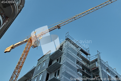 Image of Urban Building Construction With Crane