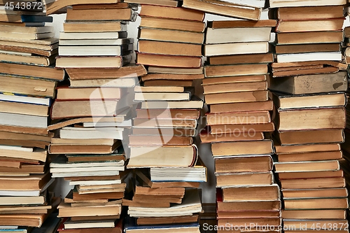 Image of Wall of books piled up