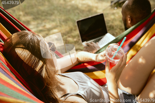 Image of Young multiethnic international couple outdoors