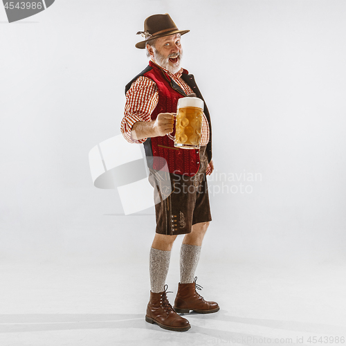 Image of Portrait of Oktoberfest man, wearing the traditional Bavarian clothes