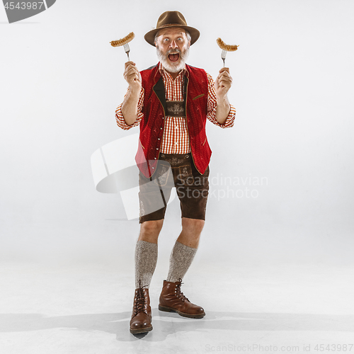 Image of Portrait of Oktoberfest man, wearing the traditional Bavarian clothes