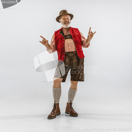 Image of Portrait of Oktoberfest man, wearing the traditional Bavarian clothes