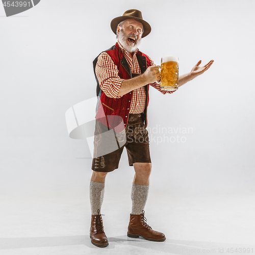 Image of Portrait of Oktoberfest man, wearing the traditional Bavarian clothes