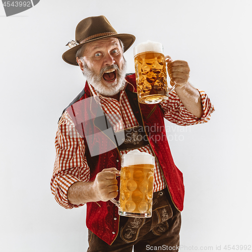 Image of Portrait of Oktoberfest man, wearing the traditional Bavarian clothes