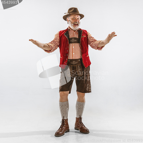 Image of Portrait of Oktoberfest man, wearing the traditional Bavarian clothes