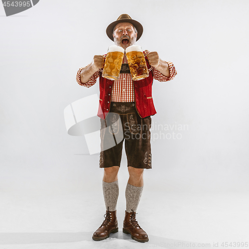 Image of Portrait of Oktoberfest man, wearing the traditional Bavarian clothes